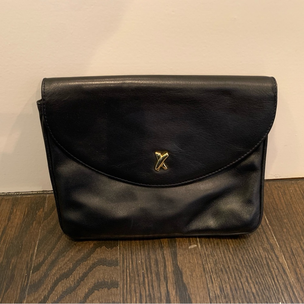Paloma Picasso Crossbody Purse in dark navy leather.